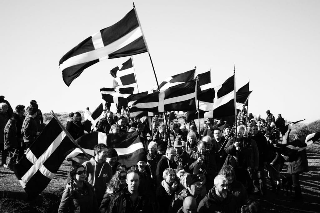 St Piran's Day Parade and sea of St Piran's flags being waved on March the 5